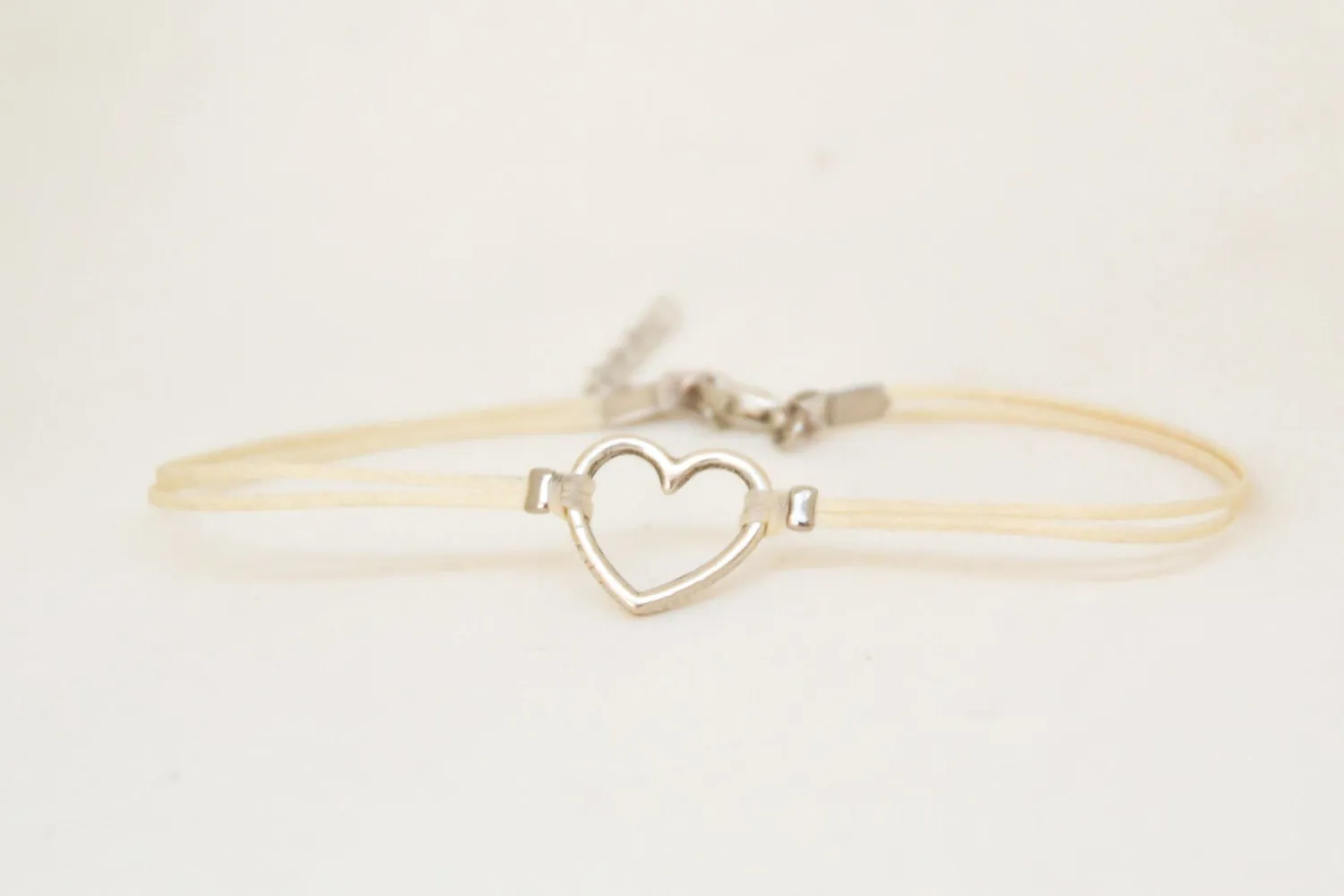 Dainty beige anklet with a silver plated heart charm, custom color