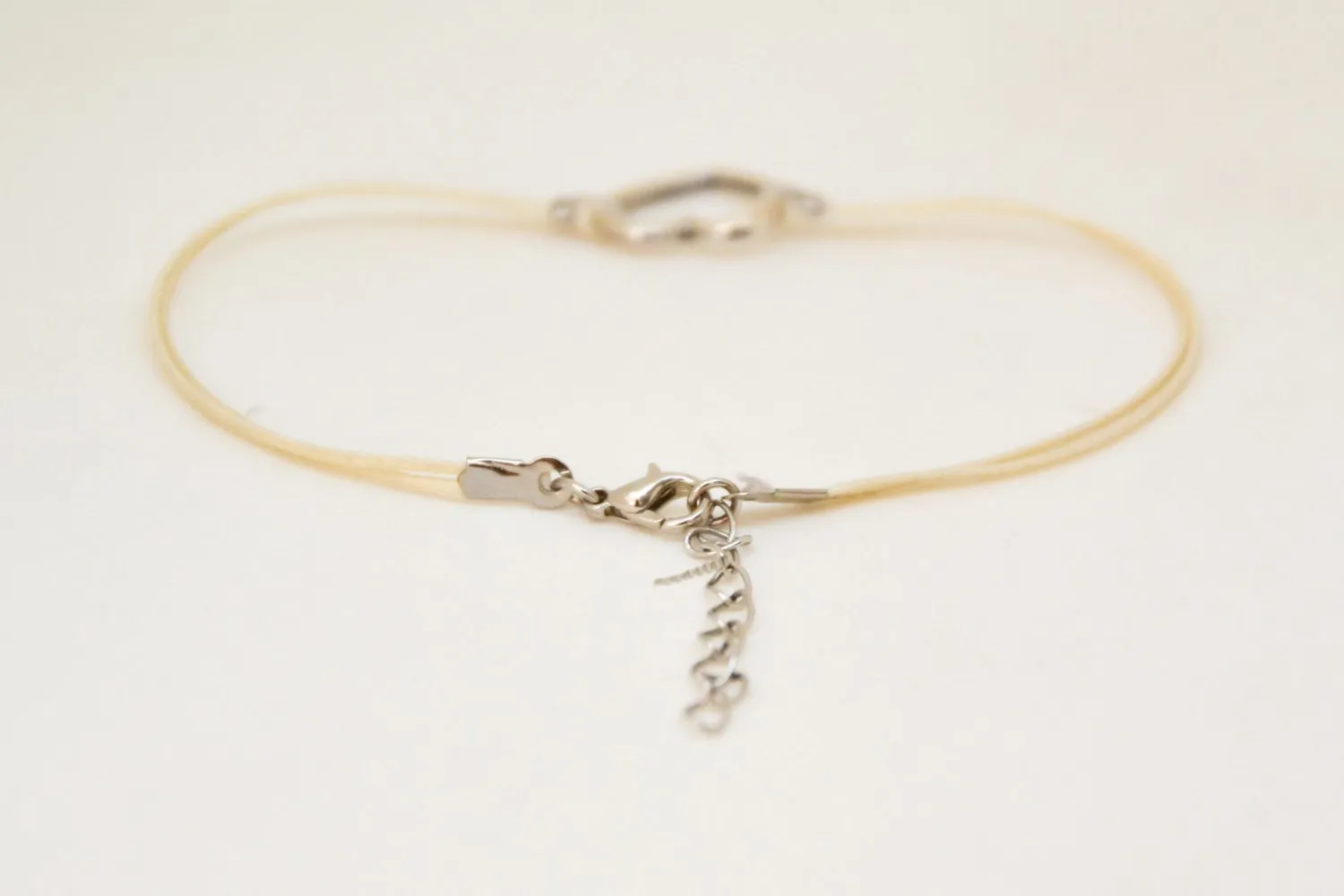 Dainty beige anklet with a silver plated heart charm, custom color