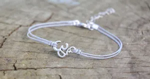 Dainty gray cord anklet with silver tone Om charm, yoga gift, adjustable ankle bracelet